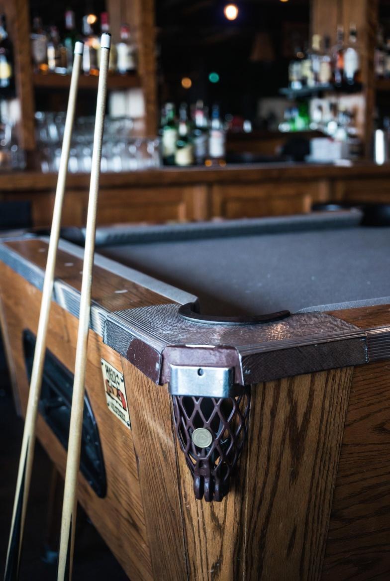 Pool table angle showing felt and rail detail